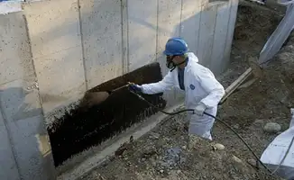 Professional waterproofing the exterior walls of the basement in Baton Rouge, LA