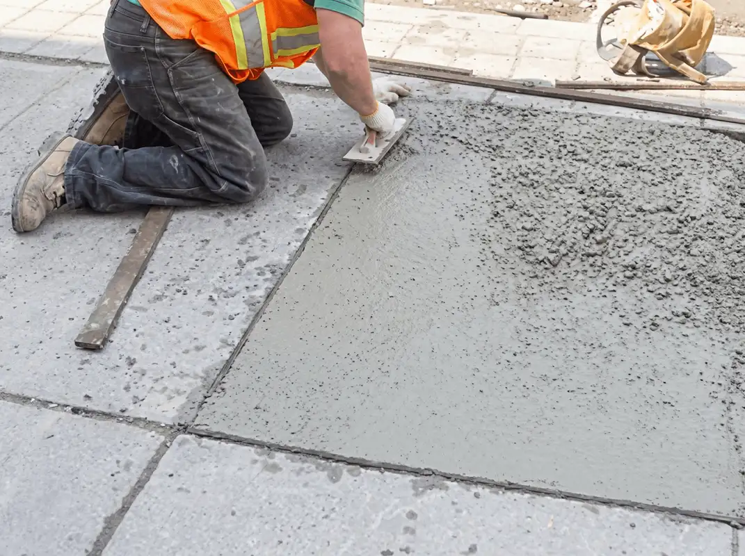 Professional repairing a concrete floor in Baton Rouge, LA