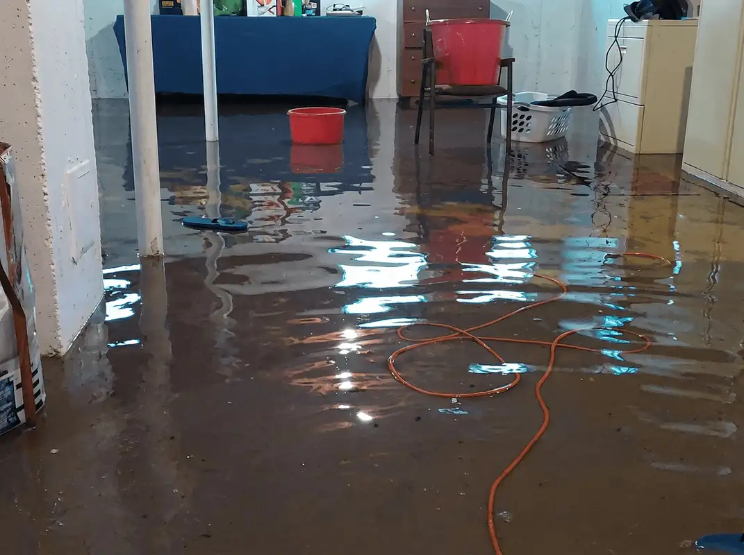 Basement with boiler, cabinets and washing machine completely flooded in Baton Rouge, LA